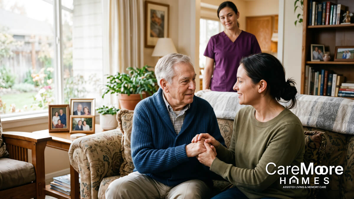 Senior man and woman holding hands with caregiver nearby.